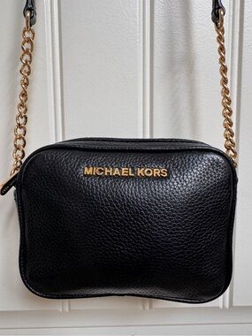 Michael Kors Black Pebble Leather Mini Camera Crossbody Bag. 6” by 4.5” by 1.5”